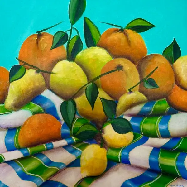 oranges and lemons on a striped cloth